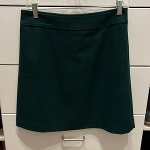 J crew wool a line mini skirt in Forrest green. Size 6